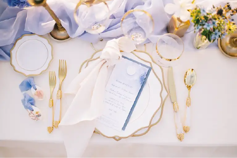 Refined tablescape with candles and greenery